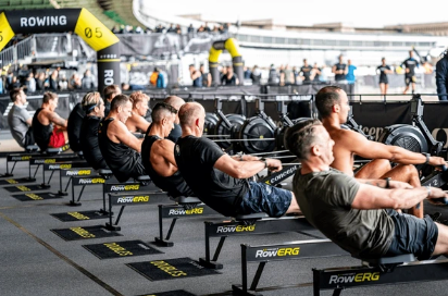 Hyrox athletes performing the rowing exercise at the Hyrox in Berlin